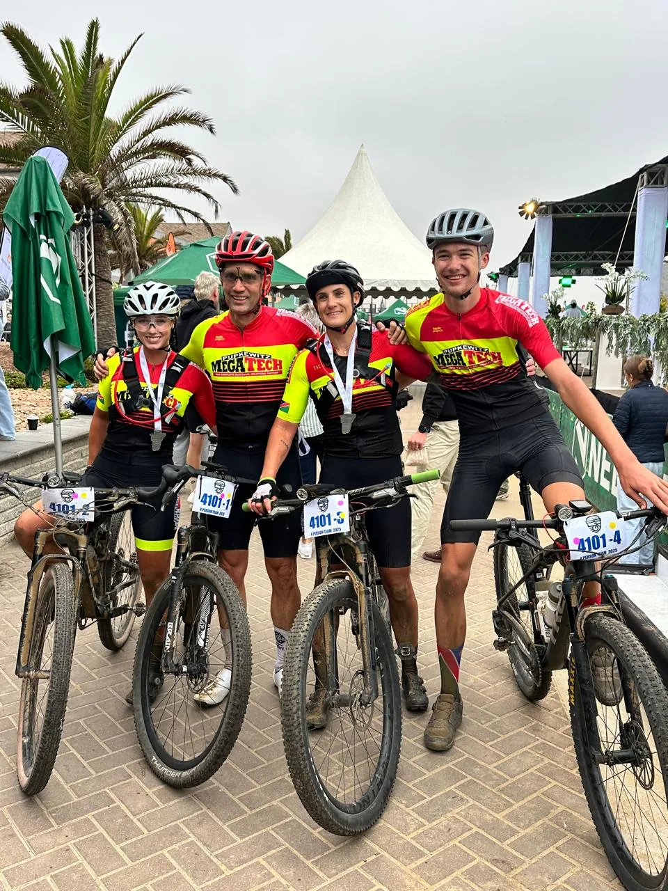Christilee Jansen with her four-person team at the finish