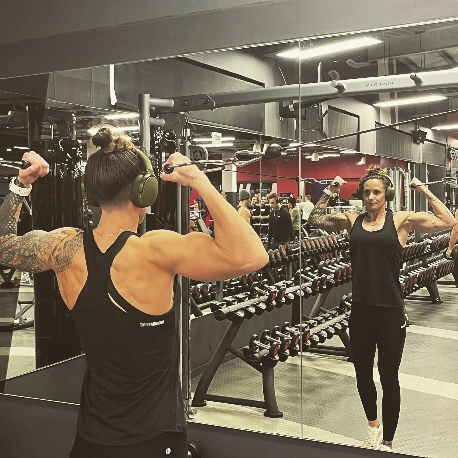Christilee Jansen in the gym mirror