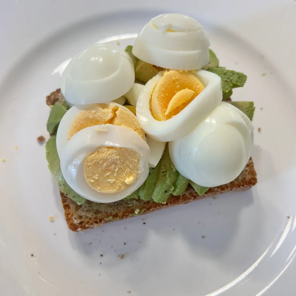 Eggs and avocado on seed toast